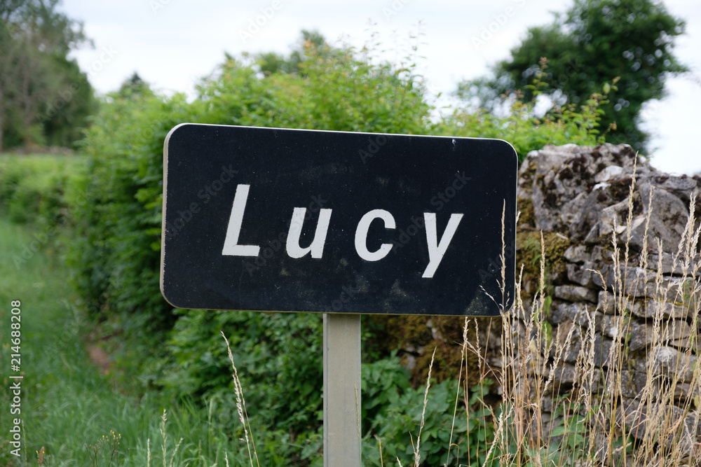 Road sign of the little french town Lucy