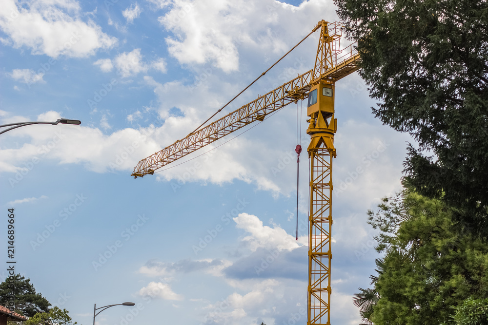 construction concept of crane on blue sky background construction concept of crane on blue sky background
