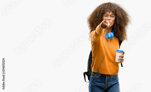 African american student woman pointing to the front with finger