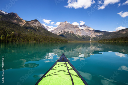 Kayaking in Emerald Lake during a vibrant sunny summer day. Located in British Columbia, Canada.