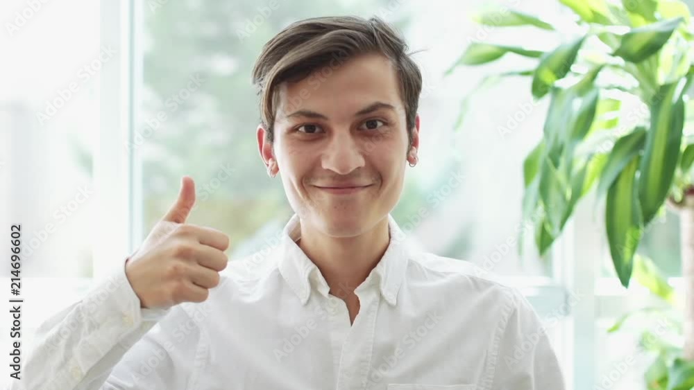 Reaction of Success, Thumbs Up, Appreciating Young Man Reaction of Success, Thumbs Up, Appreciating Young Man
