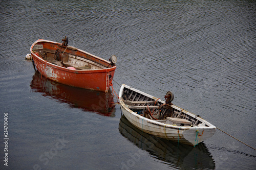 Two boats in Peggy's Cove ready before their fisherman owners.