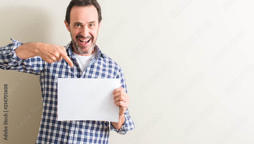 person holding blank paper