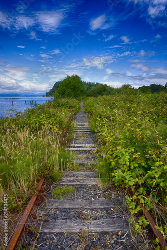 Fotografie old rusty abandoned railroad tracks in Astoria, Oregon