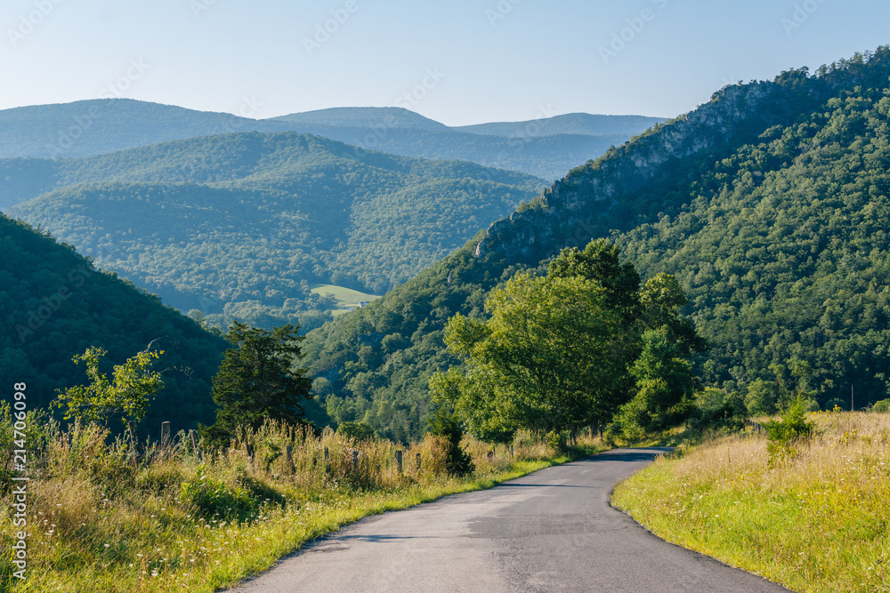 A road and view of mountains in the rural Potomac Highlands of West Virginia.