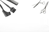 Professional hairdresser tools on white background with copy space