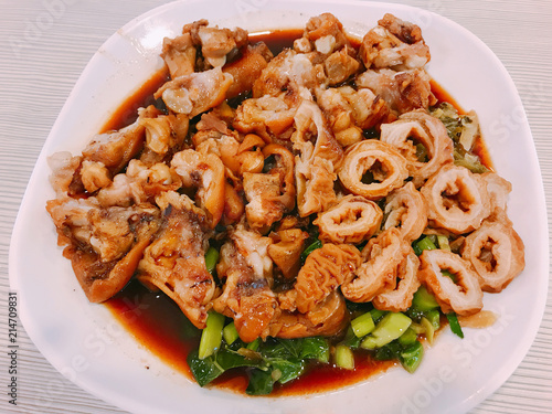 Thai stewed pork leg and chitterlings with five spices. photo
