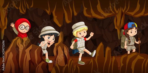 Young children exploring a cave