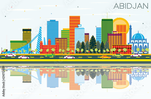 Abidjan Ivory Coast City Skyline with Color Buildings, Blue Sky and Reflections.