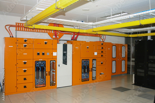 Landscape view of computer power supply in a modern corporate data centre.