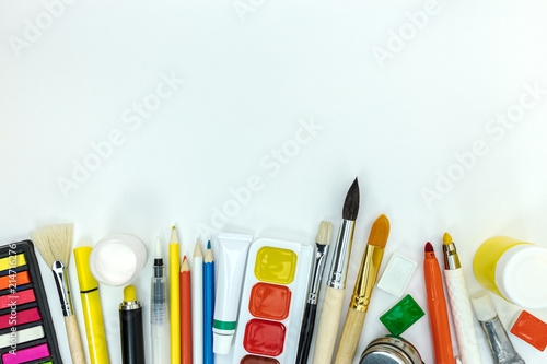 painters tools and supplies on white background. pencils, paints, markers for school kids flat view