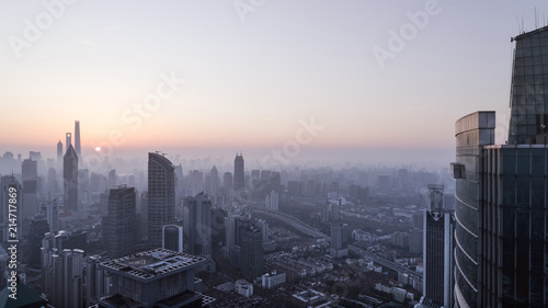 aerial view of shanghai city in foggy dawn