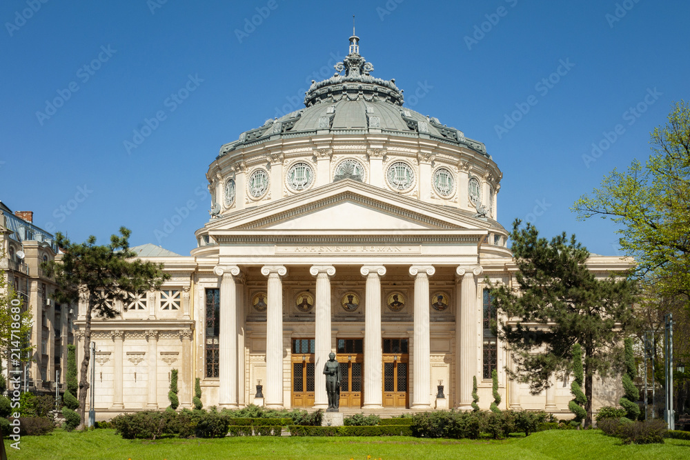 Historical landmark and vintage music hall concept with a daytime view of the Romanian Athenaeum (or Ateneul Roman), opened in 1888 to be the main concert hall in the city of Bucharest, Romania