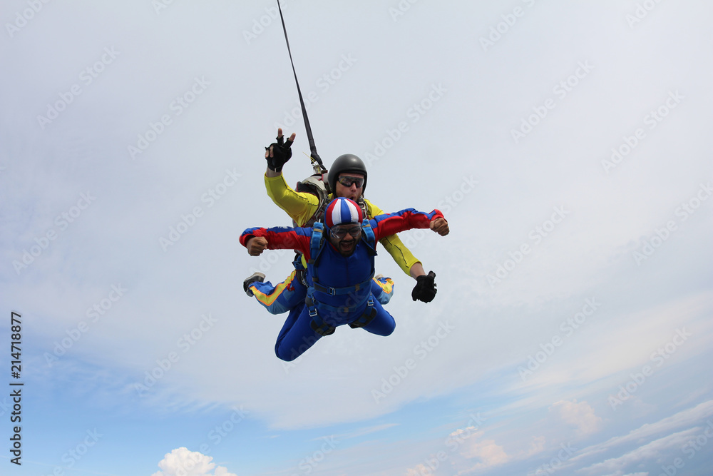 Tandem skydiving. Indian man is in the sky. Tandem skydiving. Indian man is in the sky.
