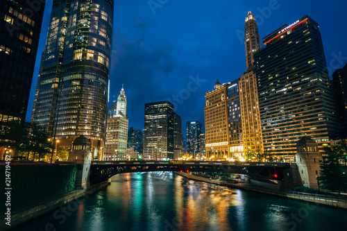 Skyscrapers along the Chicago River at night in Chicago, Illinois