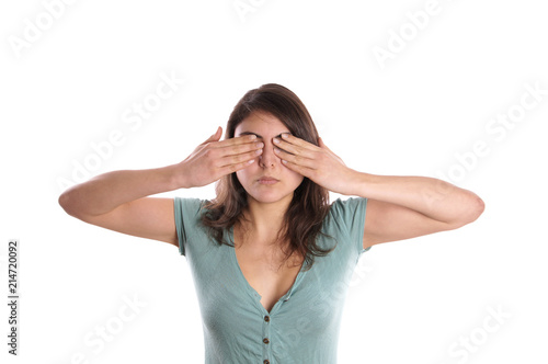 woman covering her eyes photo