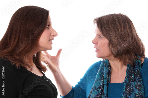 mother and daughter having an argument, isolated on white