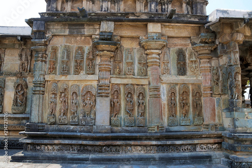 Ornate wall panel reliefs depicting Hindu deities, Ranganayaki, Andal, temple, Chennakesava temple complex, Belur, Karnataka. South wall. photo