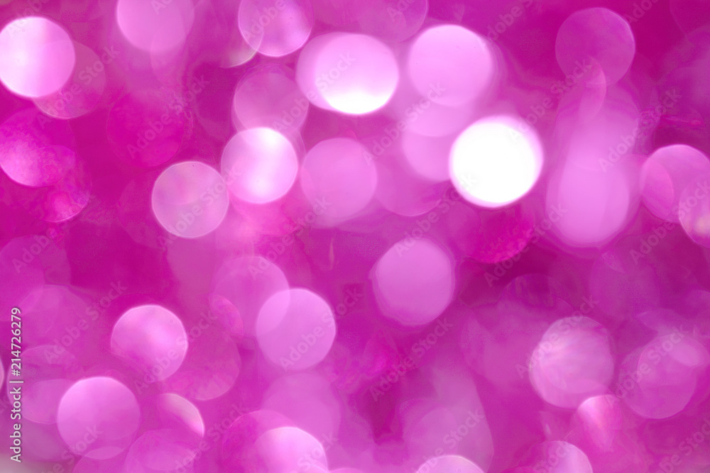 A shiny pink New Year's background for a holiday card. A wallpaper with a blurry pattern. A shiny pink New Year's background for a holiday card. A wallpaper with a blurry pattern.