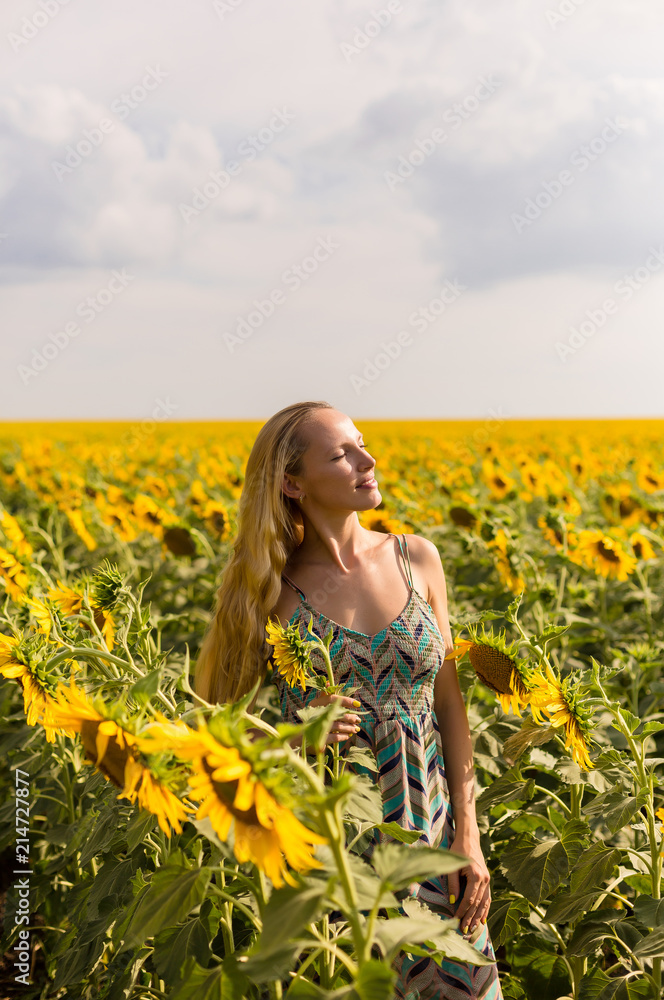 model in sunflower field model in sunflower field