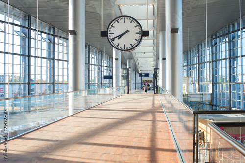 Clock at modern airport hall