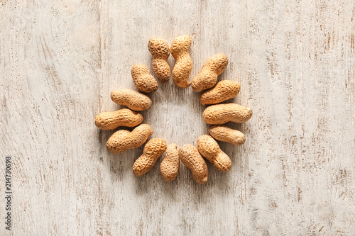 Peanuts in shell arranged i...