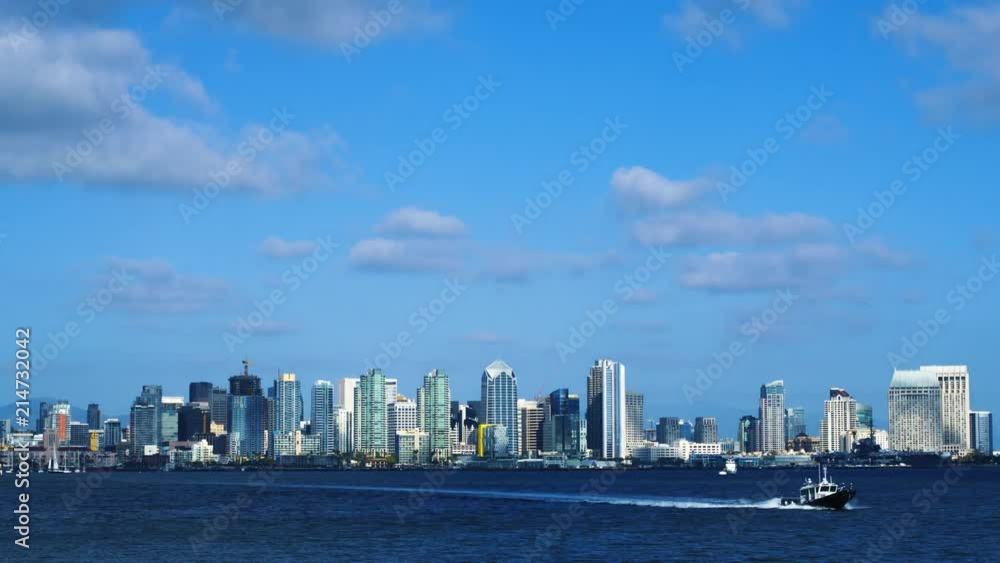 San Diego skyline from across the bay time lapse with clouds and boats. San Diego skyline from across the bay time lapse with clouds and boats.