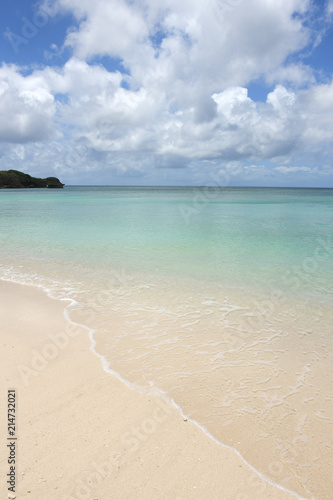 summer island sea shore with green colour wave clear water  Okinawa Japan 