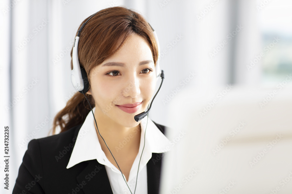 beautiful young business woman operator in headset beautiful young business woman operator in headset