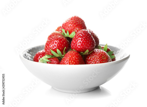 Bowl with sweet ripe strawberries on white background