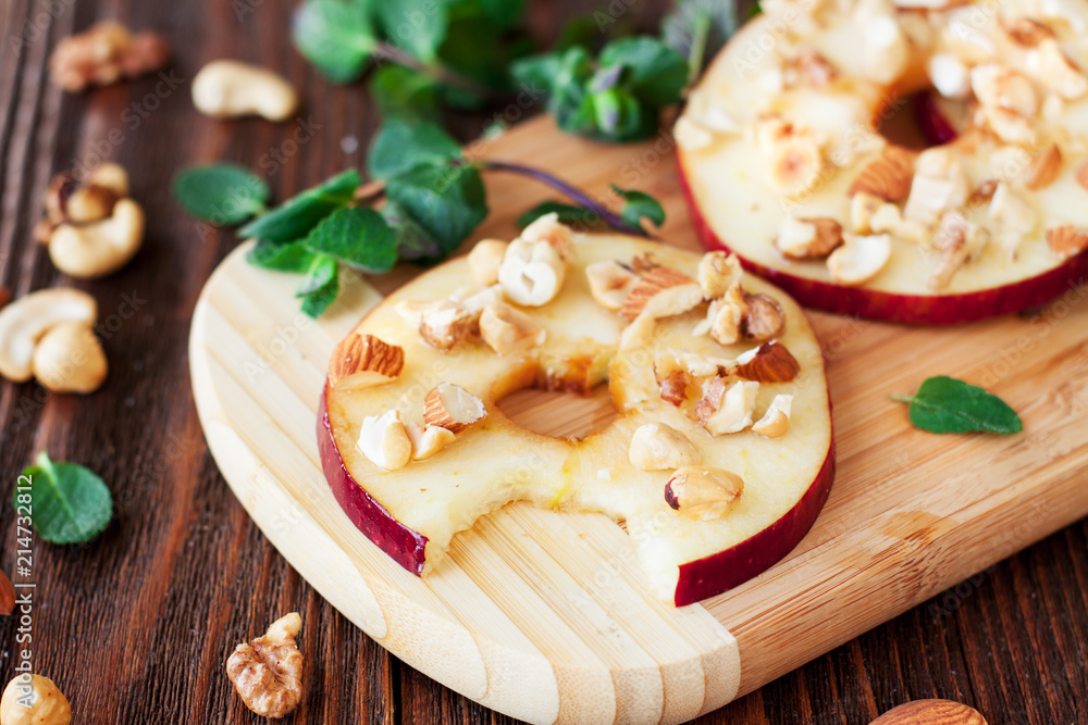 Healthy snacks sliced apples with honey and nuts Healthy snacks sliced apples with honey and nuts
