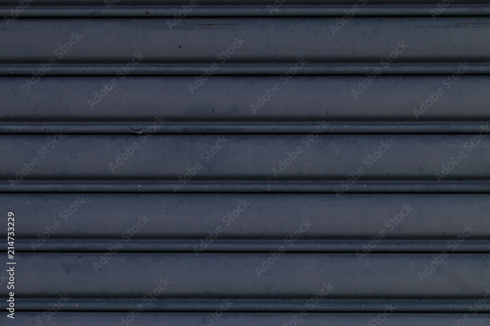 Obraz premium Roller shutter doors - grey background - close up
