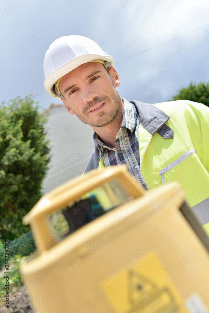 Cheerful site surveyor