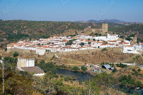 Mertola town as seen from the high opposite riverside of the Guadiana. Portugal