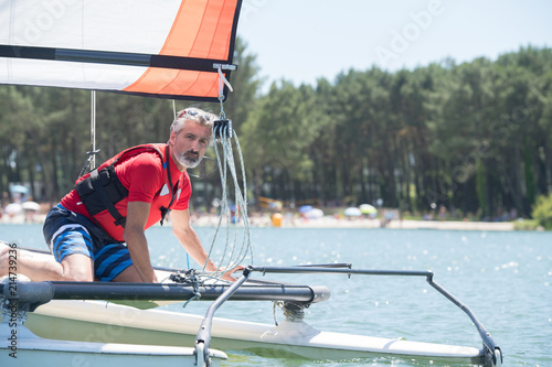 man in a sailing vessel