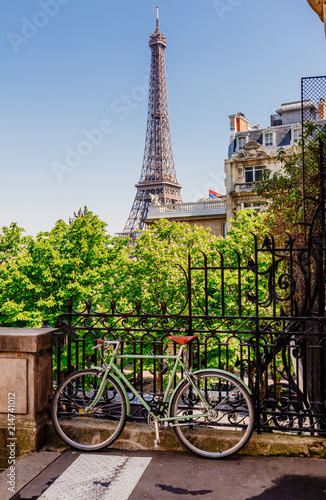 Cozy street with view of Paris Eiffel Tower in Paris, France. Eiffel Tower is one of the most iconic landmarks in Paris. © Ekaterina Belova