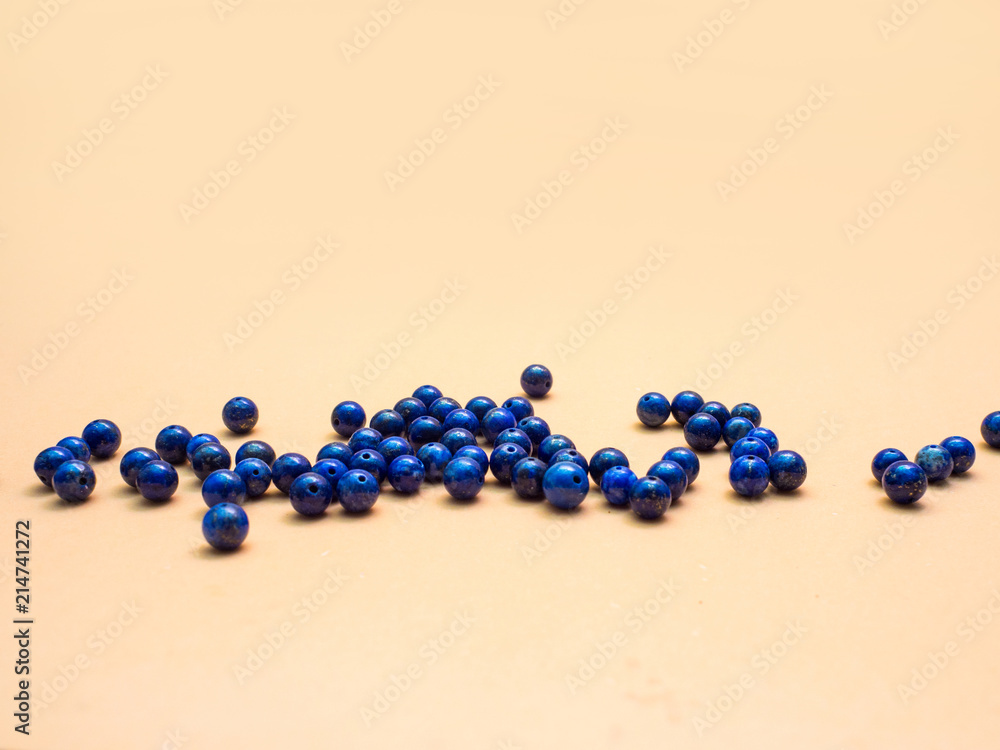 natural lapis lazuli on Orange background natural lapis lazuli on Orange background