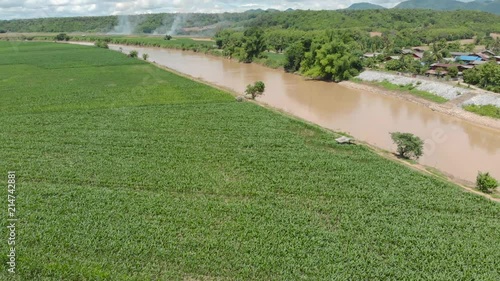 Yom river at Phrae province, North of Thailand with crop field and plantation