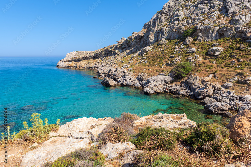 View of beautiful bay with crystal sea water near Agathi beach. Rhodes island, Greece