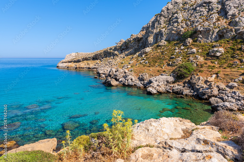 View of beautiful bay with crystal sea water near Agathi beach. Rhodes island, Greece View of beautiful bay with crystal sea water near Agathi beach. Rhodes island, Greece