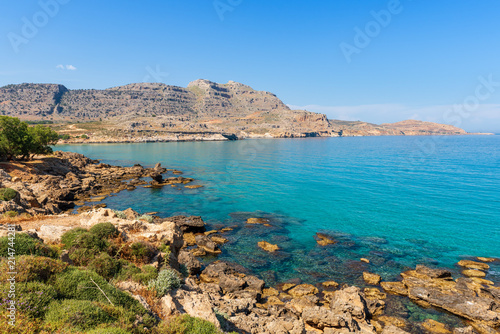 View of beautiful bay with crystal sea water near Agathi beach. Rhodes island, Greece