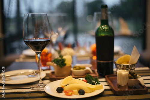 Cheese plates served with tomato and olive.