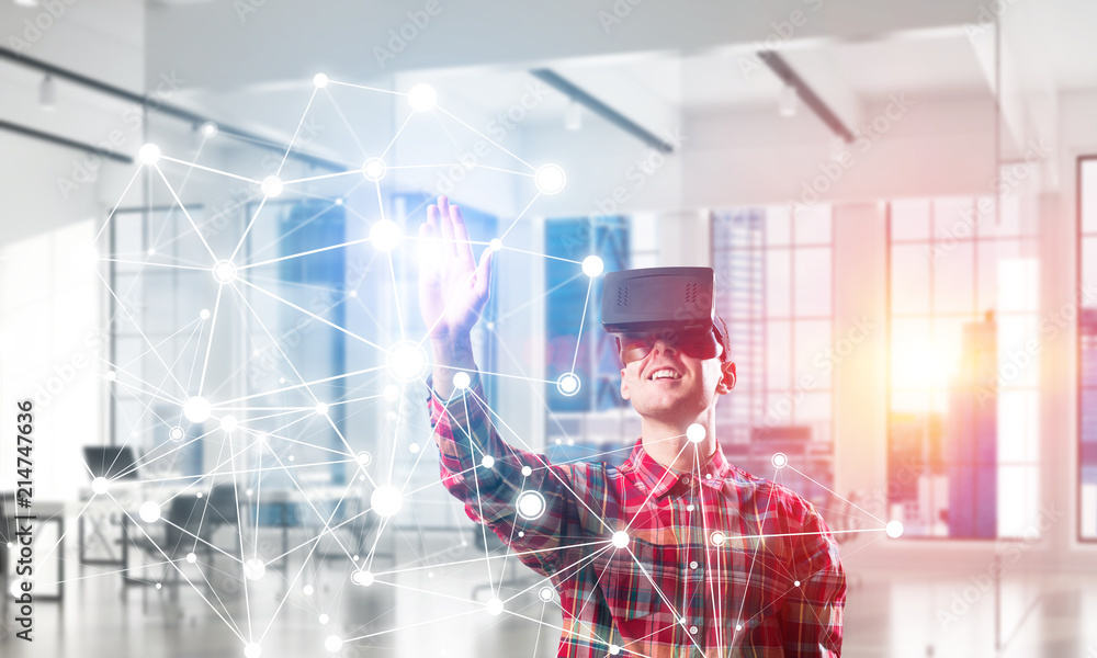 Guy wearing checked shirt and virtual mask reaching hand to touch screen Guy wearing checked shirt and virtual mask reaching hand to touch screen