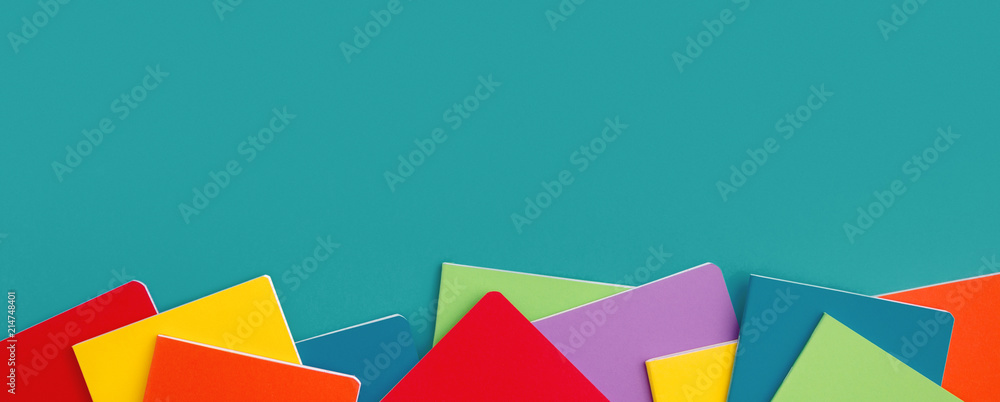 School notebooks and copy space. Colorful background School notebooks and copy space. Colorful background