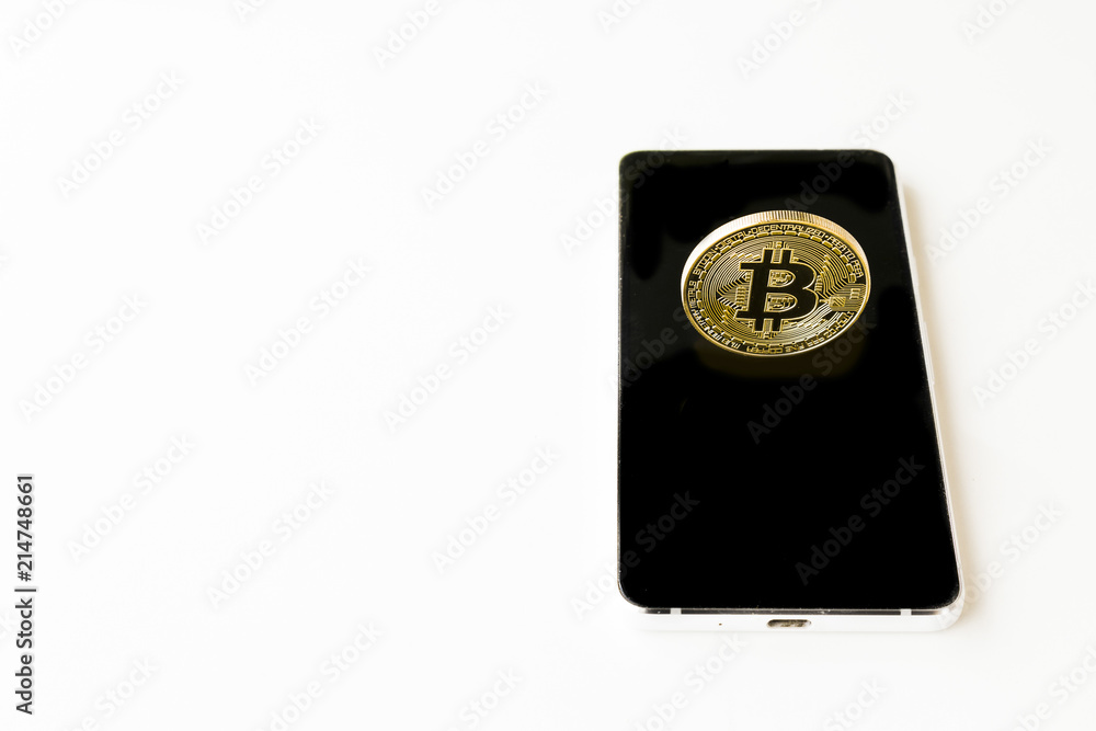 Bitcoin Cryptocurrency Digital Bit Coin BTC Currency Technology Business Internet Concept. Bitcoin over smartphone