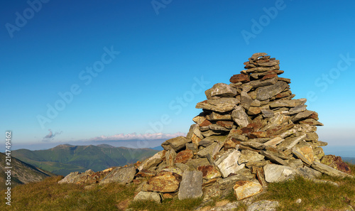 Stack of rocks marking a mountain peak