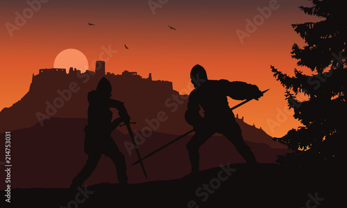 Silhouettes of two warriors fighting in a forest under the ruins of a medieval castle - Slovakia, Spis castle