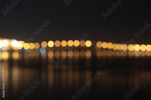 background. defocusing. night, multicolored lights on the bridge \ new year \ christmas. © Volodymyr