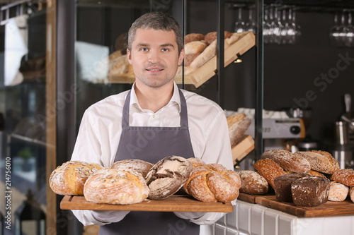 Man holding board with asso...