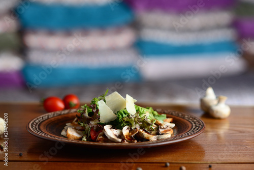 salad with meat  champignons and parmesan cheese